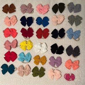 30 Infant Bows (never worn)